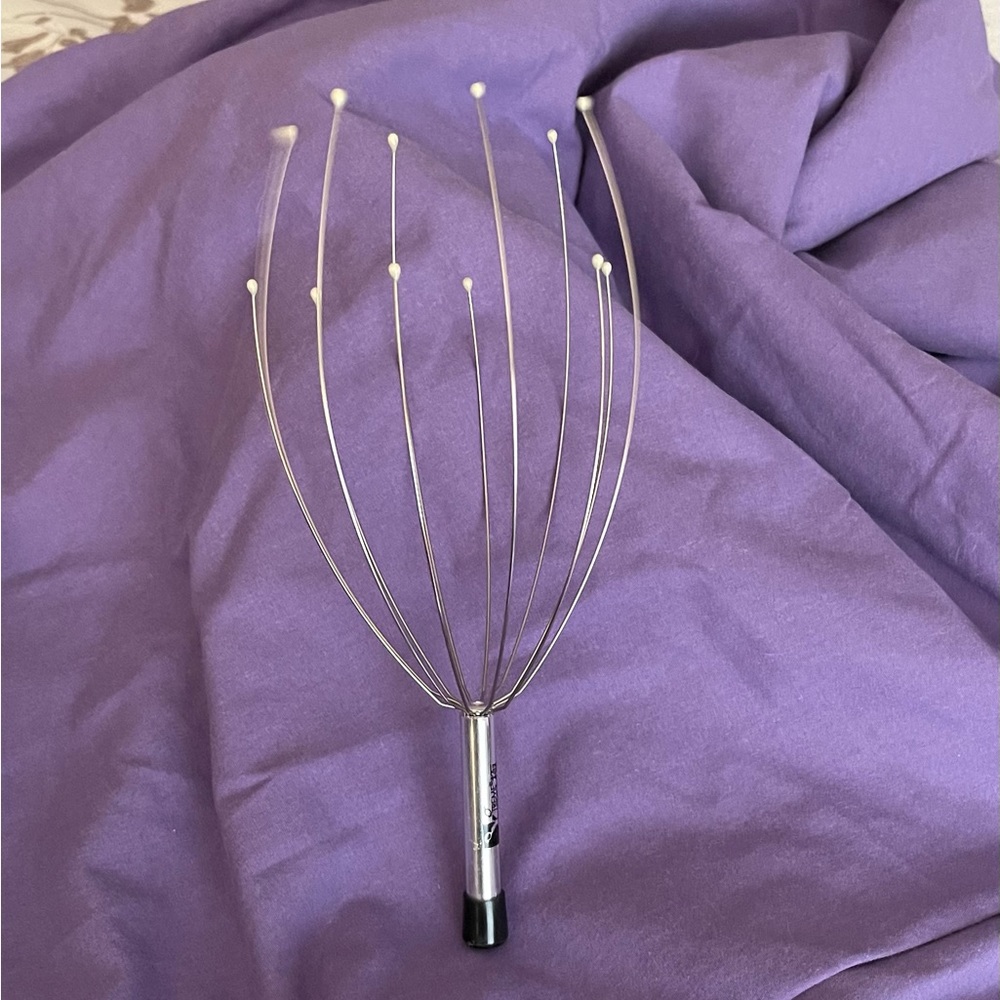 Xtreme Service Head Massager. Silver colour.
